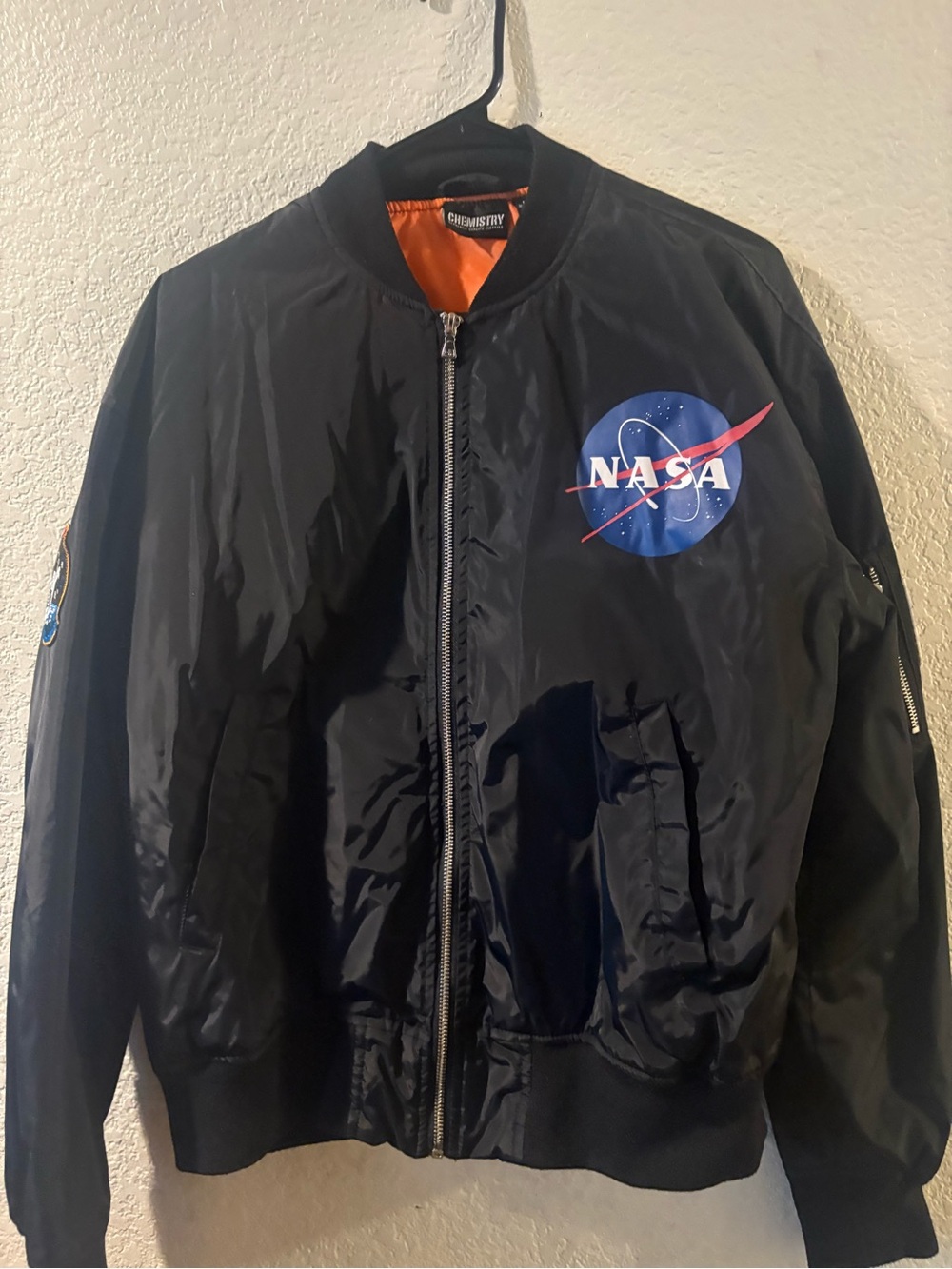 Black Bomber Jacket with Orange Lining and NASA Patch